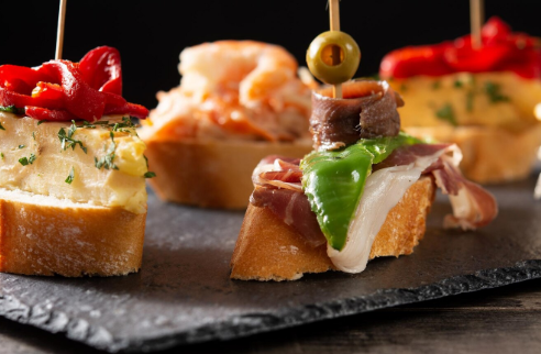 What Are Tapas in Spain? A Visitor’s Manual to Eating Like a Nearby
