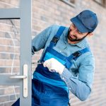 builder-installing-door
