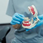 implant dentist vs general dentist